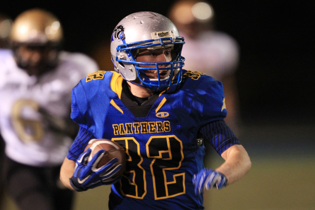 Pahranagat Valley tight end Christian Higbee picks up a first down against Spring Mountain d ...