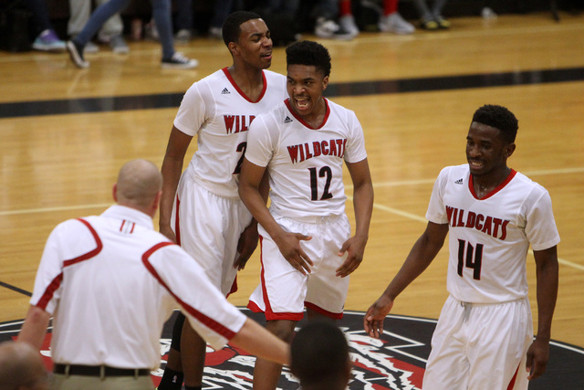 Las Vegas players, from left, Patrick Savoy, Devon Colley and Deshawn Weathers celebrate dur ...