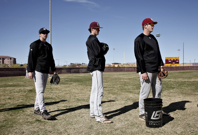 From left, Erich Uelmen, Jordan Dreibelbis and Brandon Johnson practice on Tuesday. The Fait ...