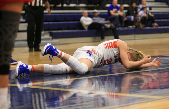 Bishop Gorman Senior Samantha Coleman (21) reacts to falling hard during the Las Vegas Invit ...