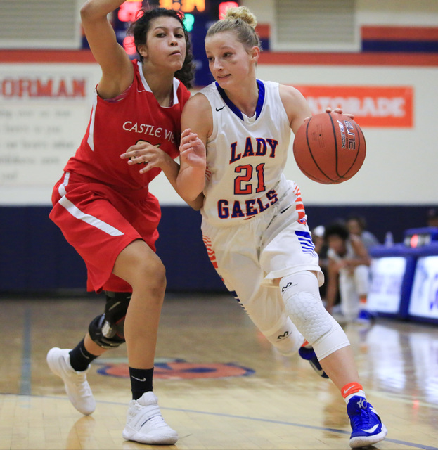 Bishop Gorman Senior Samantha Coleman (21) dribbles the ball around a defender during the La ...