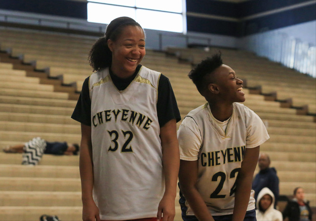 Cheyenne seniors Da’Vione Lomax and Ejanae Coopwood share a laugh during practice at C ...
