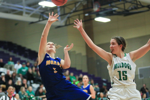 Moapa Valley sophomore Lainey Cornwall (3) shoots the ball during the Class 1A girls regiona ...