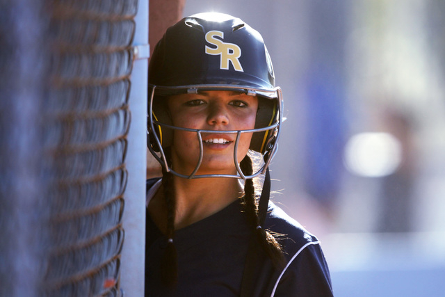 Shadow Ridge’s Justin Garganese looks out of the dugout after scoring against Centenni ...