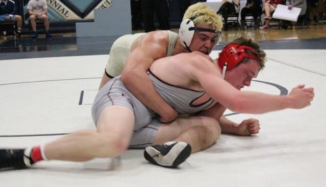 Shadow Ridge’s John Scarpati works on top of Cimarron-Memorial’s Logan Taylor in ...