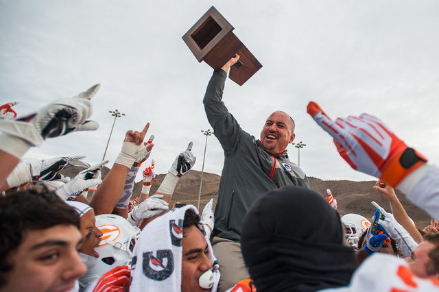 Bishop Gorman head coach Tony Sanchez celebrates the Gaels’ 70-28 win over Reed in the ...