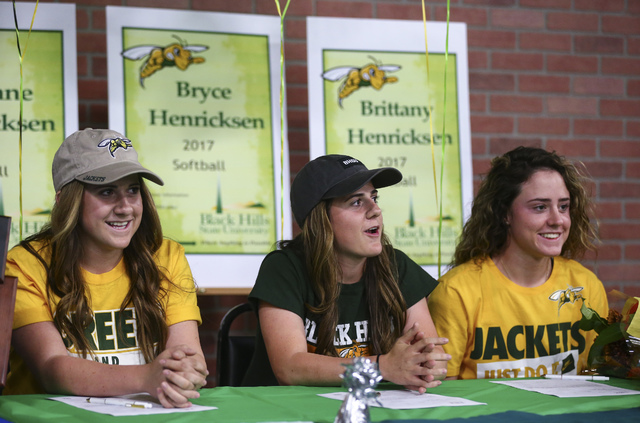 Arbor View softball players and triplets, from left, Breanne, Bryce, and Brittany Henricksen ...