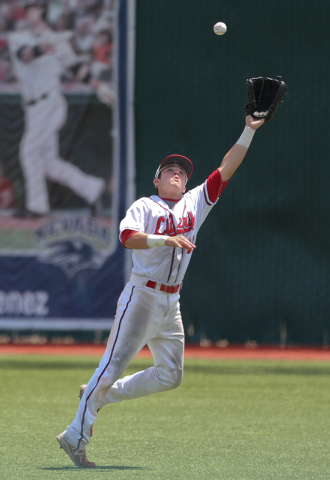 Liberty right fielder Jesse Keiser makes a catch against Centennial during the Division I st ...