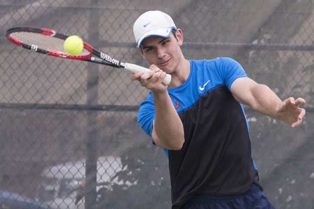 Martin Rizov from Coronado High School hits a shot during a tennis match at Liberty High Sch ...