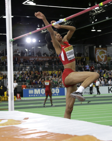 United States’ Vashti Cunningham makes an attempt in the women’s high jump final ...