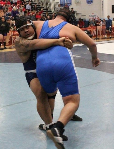 Spring Valley’s Silvano Villanueva gives the ‘shaka sign’ after winning th ...