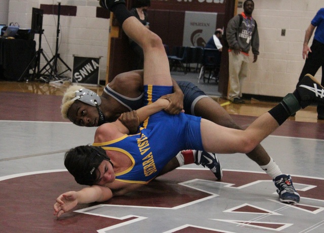 Shadow Ridge 138-pounder Nate Washington works Sierra Vista’s Mark Tirre with a revers ...