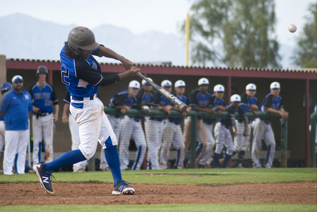 Basic’s Christian Rivero (32) hits the ball during the championship game of the Lions ...