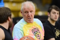 Retired basketball player and current Pac 12 Networks analyst Bill Walton interviews a playe ...