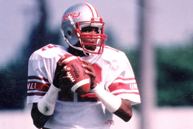 UNLV Rebels quarterback/punter Randall Cunningham drops back to pass during a game in this u ...