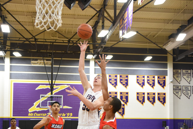 Legacy’s Brody Olenslager (55) goes up for a shot against La Salle’s Isiah Spenc ...