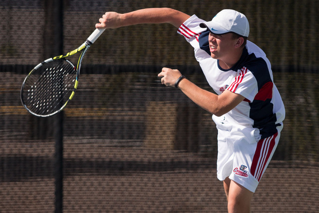 Coronado’s Sam Grant serves during the Sunrise Region boys team championship at Darlin ...