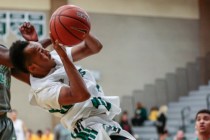 Rancho High School’s David McKeever (1) maneuvers up and around to take a shot in a ga ...