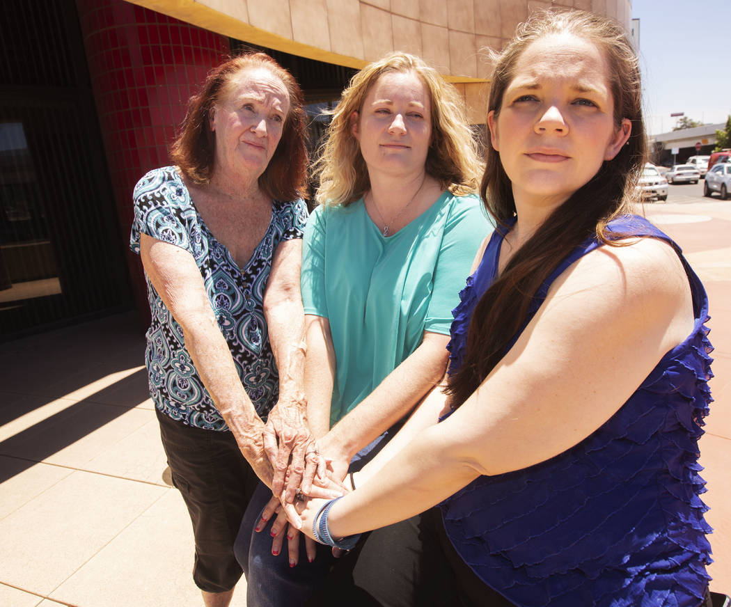 Joan Miller, 77, Jill Roberts, 43, and Lori Ann Waddell, 40, takes a portrait outside of the La ...