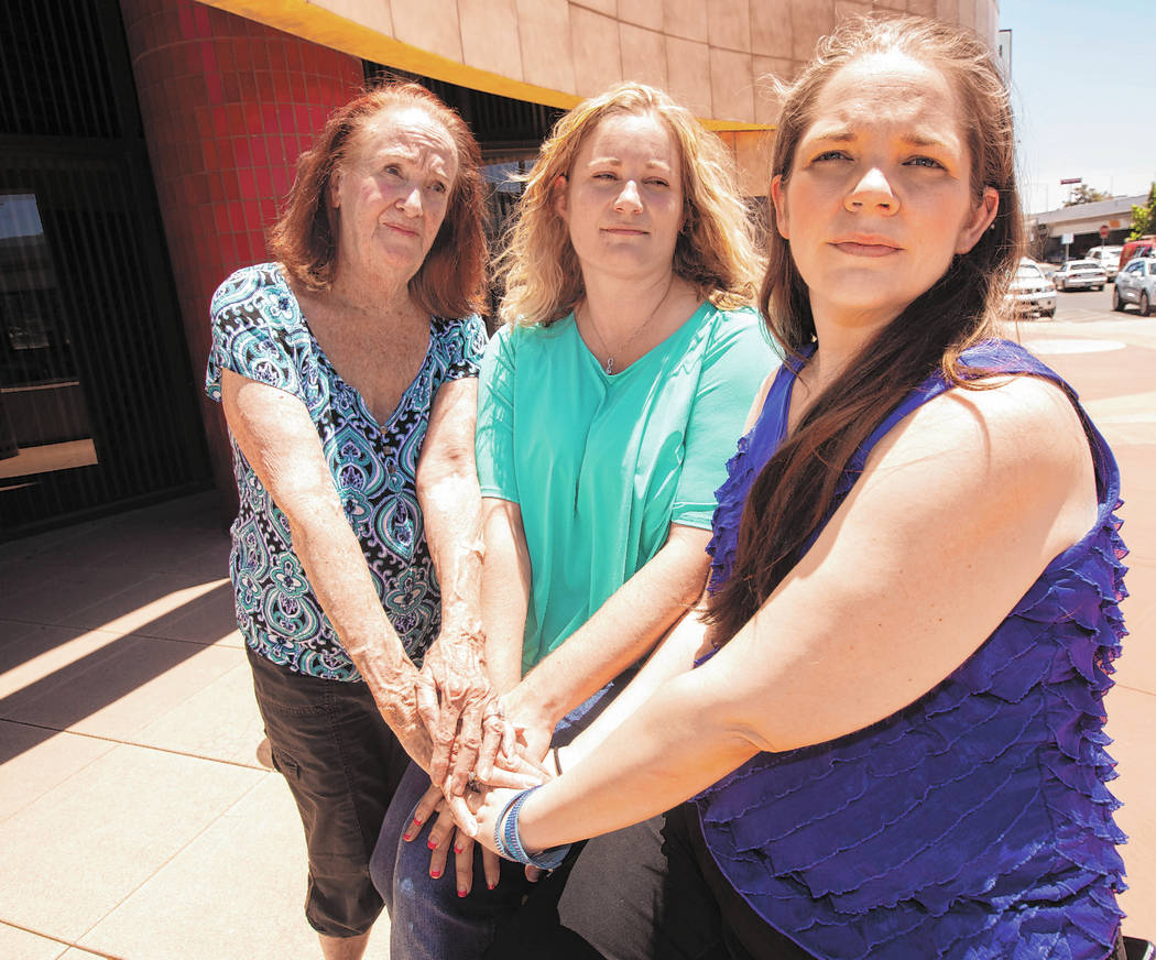 Joan Miller, 77, Jill Roberts, 43, and Lori Ann Waddell, 40, takes a portrait outside of the La ...