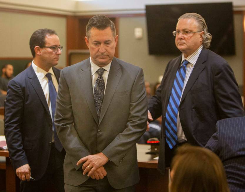 Scott Gragson, center, walks out of court after his hearing for a fatal DUI with his attorneys ...