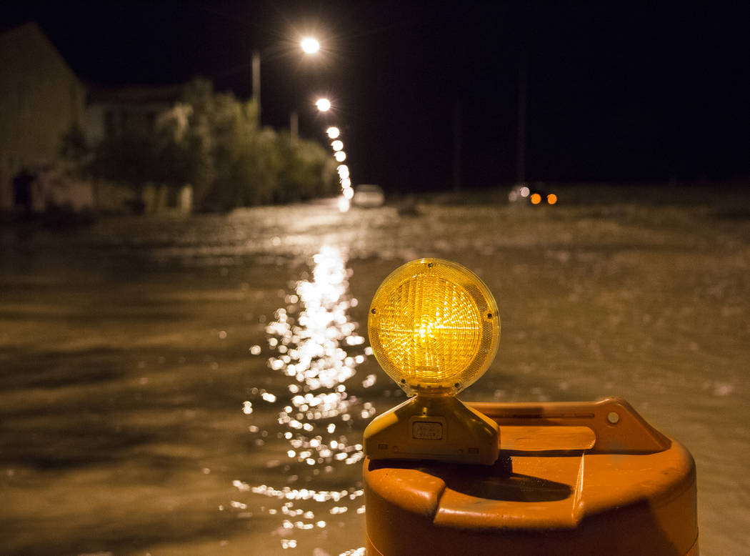 Nearly three feet of floodwaters fill the intersection of West Fitzwilliam Avenue near South Fo ...