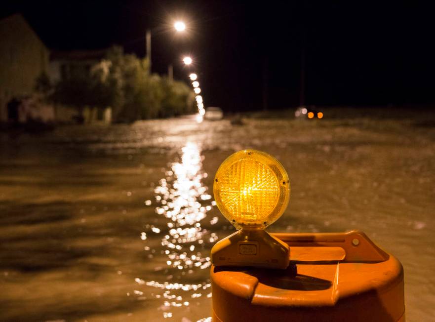 Nearly three feet of floodwaters fill the intersection of West Fitzwilliam Avenue near South Fo ...