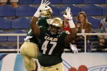 UAB defensive lineman Anthony Rush (47) celebrates with wide receiver Xavier Ubosi after Ubosi ...