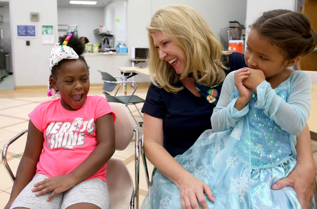 Kimberly Trueba, CEO of Girl Scouts of Southern Nevada, visits with Qris'lya "Gigi" P ...