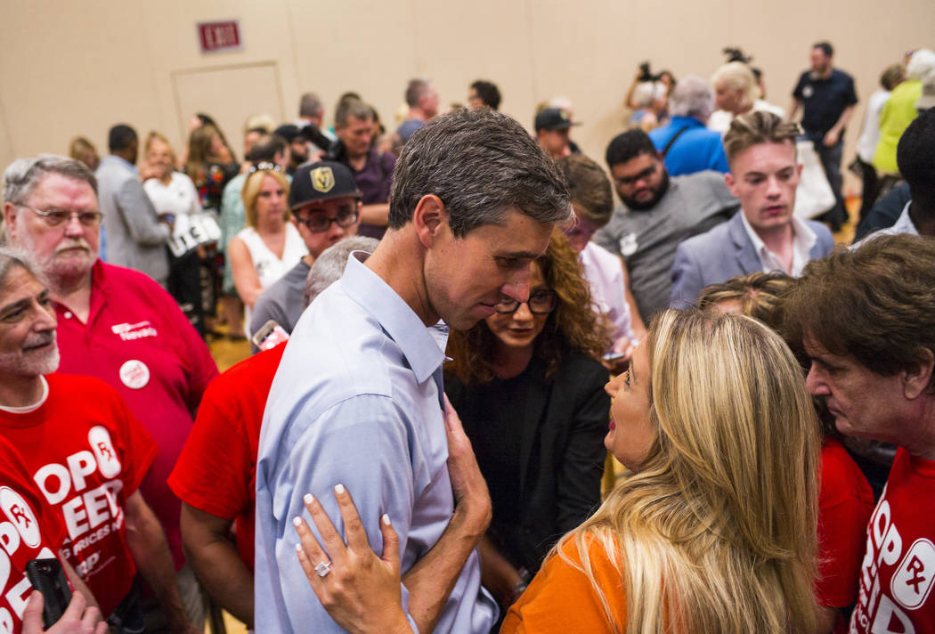 Democratic presidential candidate and former Texas congressman Beto O'Rourke talks with support ...