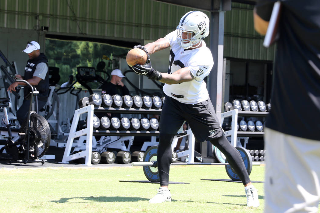 Oakland Raiders tight end Darren Waller (83) catches a ball during a drill at the NFL team's tr ...