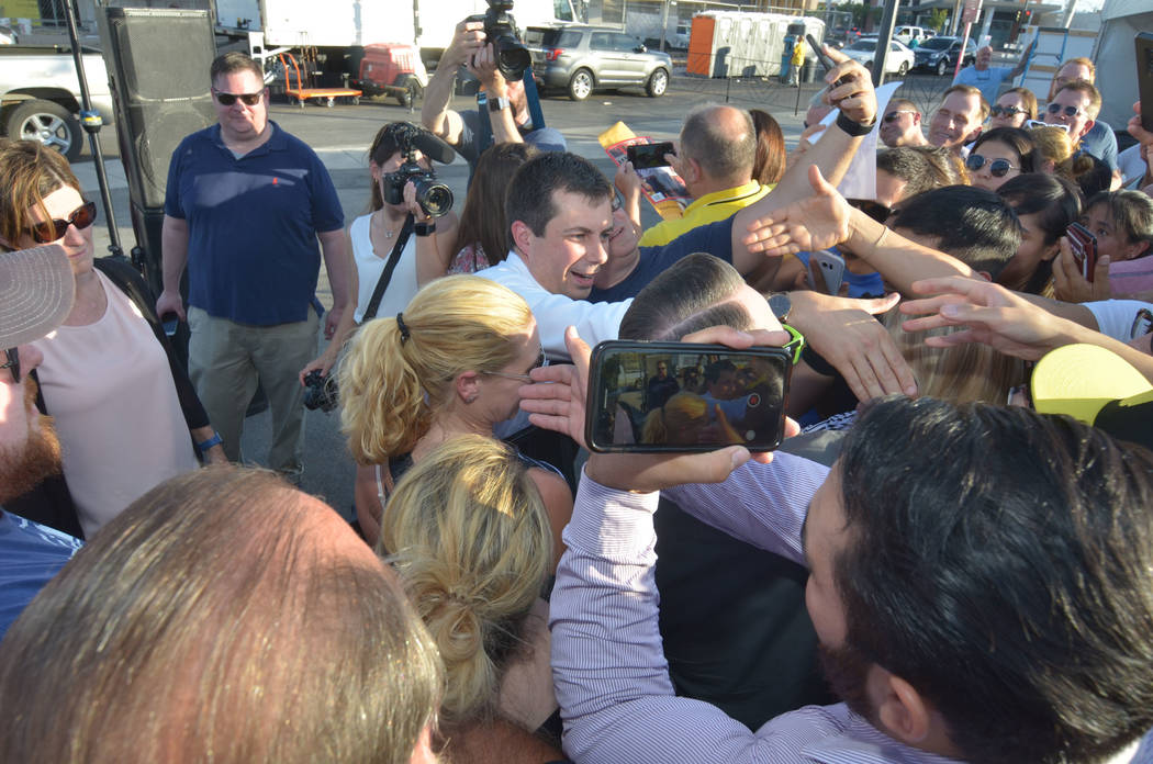 Democratic presidential candidate and South Bend, Ind., Mayor Pete Buttigieg greet people durin ...