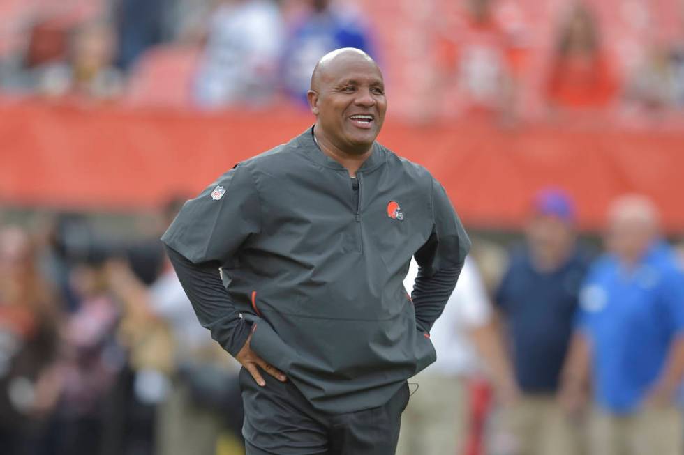 Cleveland Browns head coach Hue Jackson walks on the field before an NFL football preseason gam ...