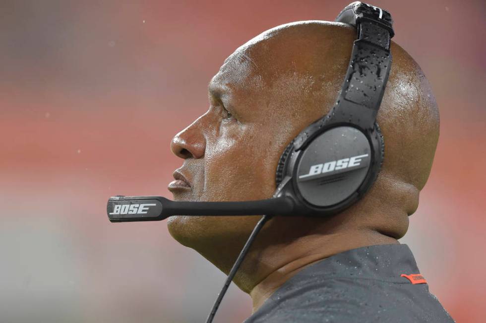 Cleveland Browns head coach Hue Jackson walks on the sideline during an NFL football preseason ...