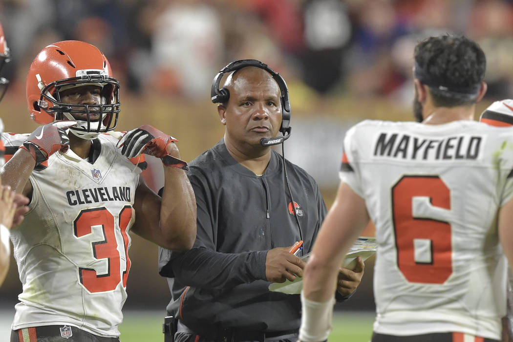 Cleveland Browns head coach Hue Jackson walks on the sideline during an NFL football preseason ...