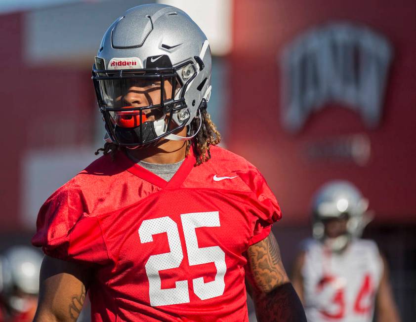 UNLV defensive end/linebacker Gabe McCoy (25) works through drills during the first day of trai ...