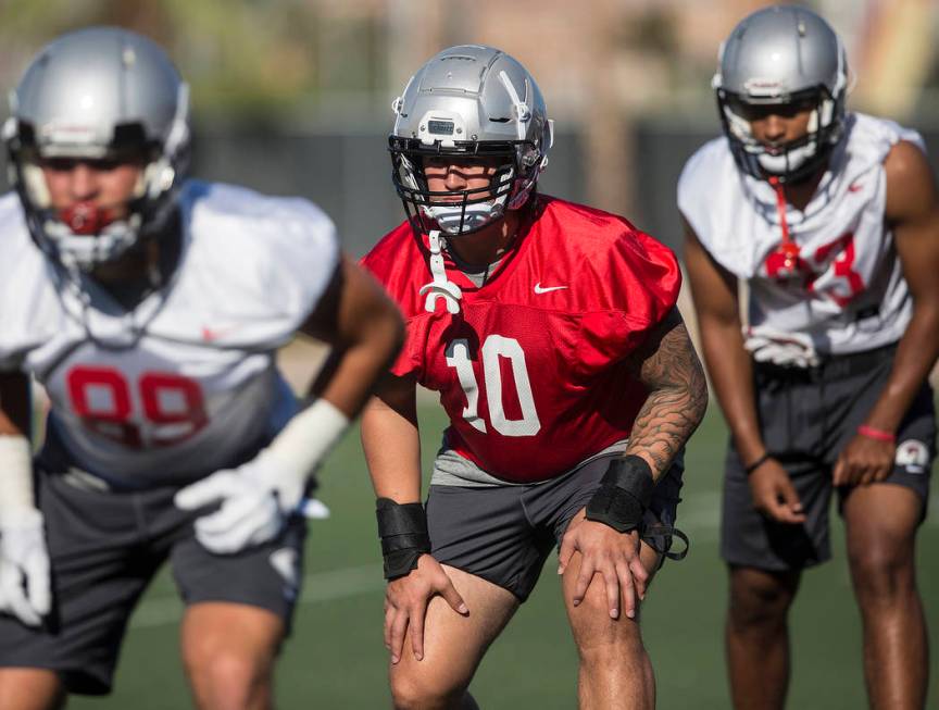 UNLV linebacker Vic Viramontes (10) works through drills during the first day of training camp ...