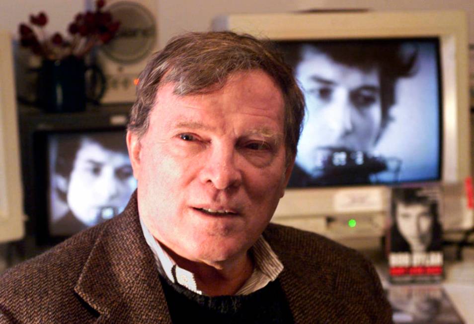 In this Jan. 27, 2000 file photo, documentary filmmaker D.A. Pennebaker is flanked by 35-year-o ...