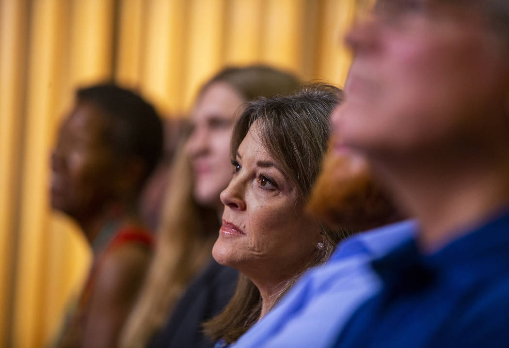 Democratic presidential candidate Marianne Williamson listens to her introduction as she will s ...