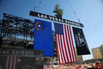 A steel beam is lifted during the Las Vegas Stadium Topping Out Ceremony in Las Vegas, Monday, ...