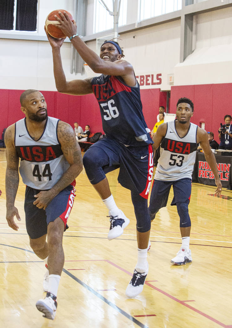 Center Myles Turner (56), of the Indiana Pacers, jumps for a layup against Forward P.J. Tucker ...