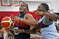 Myles Turner (56), of the Indiana Pacers, pushes past Bam Adebayo (39), of Miami Heat, to attem ...