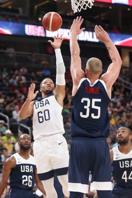 USA Men's National Team White guard Jalen Brunson (60) takes a shot under pressure from USA Men ...