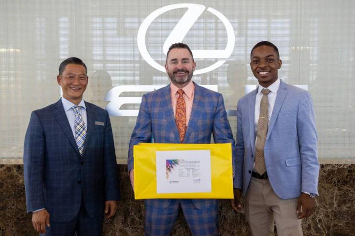 From left, certified sales and leasing consultant Tyron Shigemoto, General Manager Ryon Walters ...