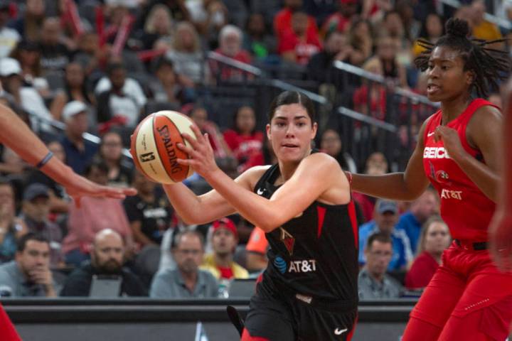 Las Vegas Aces guard Kelsey Plum (10), takes the ball to the hoop for a layup against Washingto ...