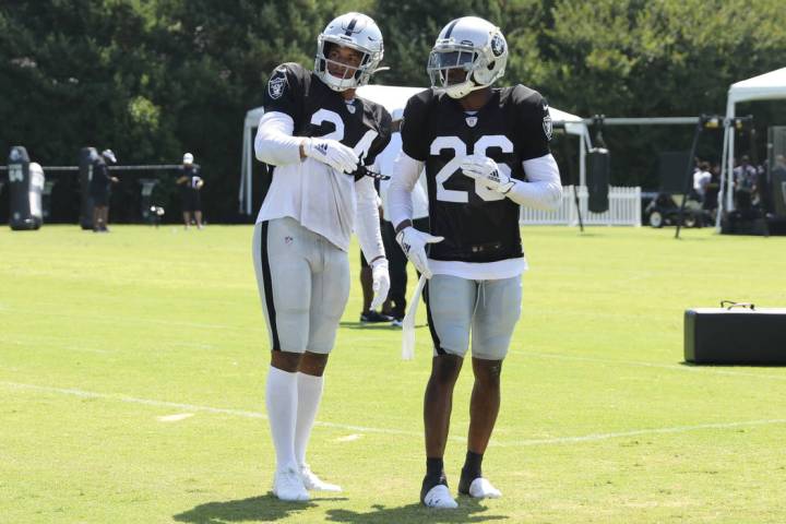 Oakland Raiders safety Johnathan Abram (24) and Oakland Raiders cornerback Nevin Lawson (26) wo ...