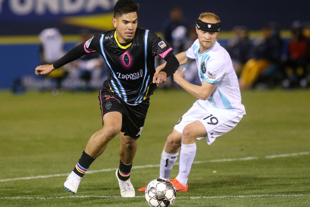 Las Vegas Lights FC midfielder Cristhian Hernandez (10) moves with the ball past Austin Bold FC ...