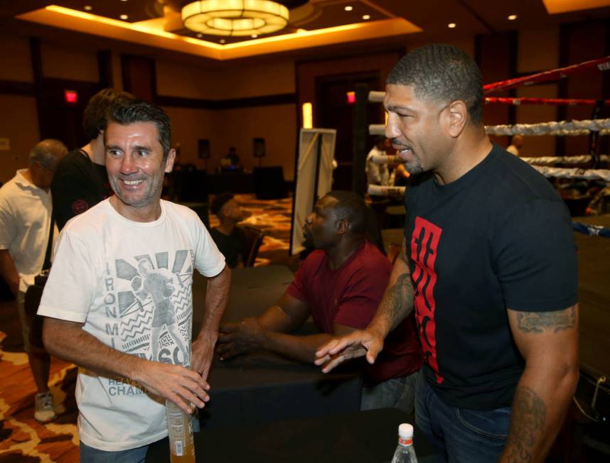 Nevada Boxing Hall of Fame inductee Wayne McCullough, left, visits with Ronald " Winky &qu ...