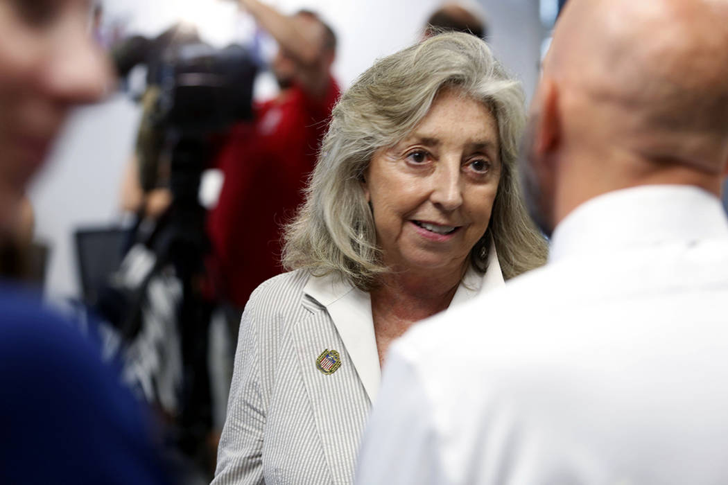 U.S. Rep. Dina Titus, D-Nev., speaks with cancer survivor and health care advocate Joe Merlino ...