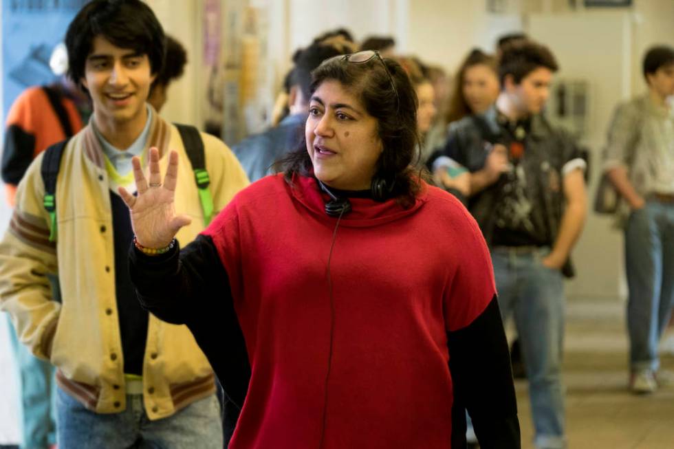 Viveik Kalra, left, and director Gurinder Chadha on the set of "Blinded by the Light." (Nick W ...